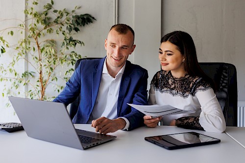 man_and_woman_reviewing_on_pc.jpg Compliance Specialists